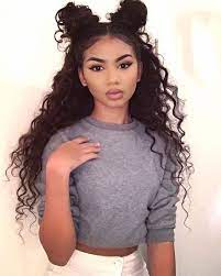 Say Goodbye To The Half Up Half Down Bun Double Buns Have Officially Taken Over As The Trendiest Coo Hair Styles Curly Hair Styles Naturally Long Hair Styles