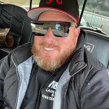 Who can recommend a reasonably priced contractor for framing and installing  a small door in Fuquay Varina, NC?