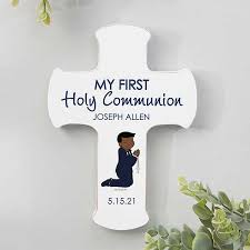 An attractive rosewood cross to commemorate their first holy communion, this classically styled cross features a gold inlaid cross and a kneeling boy with a chalice and host accent at center. Personalized First Communion Cross For Boys