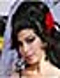 Drunken' Winehouse heckled off stage at shambolic concert