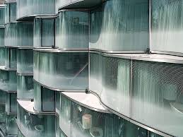 Hotel Wagram Paris Undulating Unitised Facade Made From Bent Insulating Glass Units By Seele The Cavities Between The Pane Facade Hotel Facade Facade Design