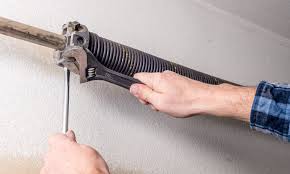 Garage door alignment do it yourself. 7 Easy Steps To Adjust Garage Door Springs