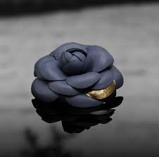 The Camellia A Flower Of Stark Simplicity And Pure White Could Not Fail To Charm Mademoiselle Chanel Description Chanel Flower Chanel Camellia Chanel Brooch