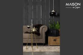 Great in the family room, bedroom, office, or even as a charming console, it features solid oak construction and a convenient cabinet door that opens to a nice storage area.circa early 1900smeasures 33h x 43.5w x 19d Eliot Side Table With Antique Brass Finish Dutch Bone 59cm