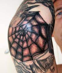 However, in modern times, the spider web tattoo has become associated with positive meanings, too. Black Ink Spider Web Tattoo On Man Right Elbow