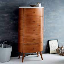 Drawers, about counter top height, oh, and it had to fit in the nook, which was 16 inches deep by 24. Penelope Narrow 5 Drawer Dresser