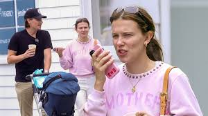 Millie Bobby Brown, 21, enjoys outing with adopted baby wearing 'mother'  top | Metro News