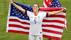 Kelley O Hara Scoops Up Dropped American Flag Wins Over The Internet With Post Game Kiss Locker Room Celebration 11alive Com