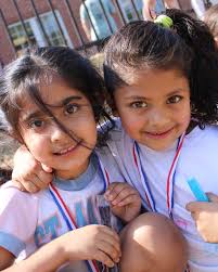 Soaking up the sun this Field Day! This morning, North Campus students  enjoyed a fabulous Field Day full of fun activities. Bouncy ball races,  hurdle jumps, and popsicles were only the beginning