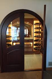 Another beneficial aspect of insulated glass is its low heat emissivity, which is responsible for reducing heat. Wine Cellar Doors Revel Custom Wine Cellars