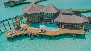 The water villas in maldives are famous for providing their guests unmatched services and unforgettable experiences. Over Water Villa In The Maldives With A Private Pool And A Water Slide Into The Indian Ocean Mansion Global