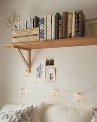Be productive and be comfortable as you work be productive and be comfortable as you work or write with the bed desk small bookshelf table. Book Shelf Above The Bed With Lights Stringing Down Love It Bohemian Homedecor Bookshelves In Bedroom Above Bed Decor Shelf Decor Bedroom