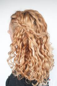 Half up half down hairstyles are the perfect marriage between casual and chic, without the effort that a full updo requires. An Easy Half Up Braid Tutorial For Curly Hair Hair Romance