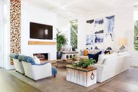 Colorful furniture in this boho living room pops against white walls. 35 Living Room Ideas Looks We Re Loving Now Hgtv
