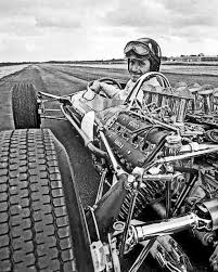 British Double World Champion Graham Hill Testing The 1967 Lotus 49 With The New Ford Cosworth Engine The Car W Classic Racing Cars Vintage Race Car Indy Cars