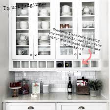 This is just a frame that supports glass panes. Display Shelf Organization How To Organize Kitchen Display Cabinets The Decor Formula