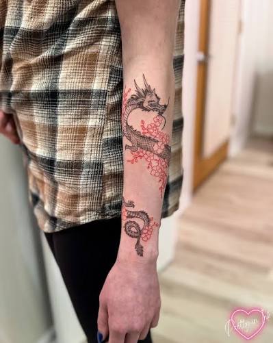 Dragon and flower blossom arm wrap✨ • • • • • • #fkirons #tattoo #tattoos #ink #inked #finelinetattoos #finelinetattoo #art #tattooartist #tattooart #tattooed #tattoolife #tattooideas #love #artist #instagood #tattoodesign #tinytattoo #tattooing ...