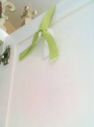 Use An Upside Down Command Hook To Hang A Wreath On A Cabinet Door Going To Use This For My Pantry Door Mini Wreaths Home Decor Hacks Decorating Tips
