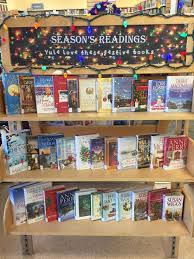 December display - Yule love these festive books | Library book displays,  Library displays, Christmas library display