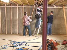 Using a hammer drill, glue the bottom plate tight to the floor. How To Frame A Wall How Tos Diy