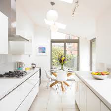 The large glass doors and a skylight make it such a light filled space.' 14. Kitchen Of The Week Simple Style Opens Up A Narrow Galley Space Houzz Ie