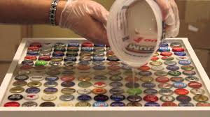 Bottle Cap Table Top Tutorial Want To Make This In The Kids New Red White And Blue Room Maybe Using Coke T Bottle Cap Table Beer Cap Crafts Bottle Cap Art