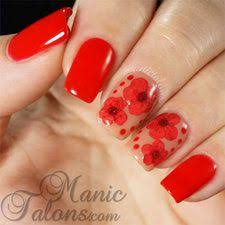 Dried flowers for resin jewelry are placed. Gel Polish And Dried Flowers Red Nails Gel Polish Nail Art Flower Nails