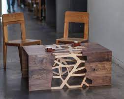 It's a woodland haven with an armoire storage cabinet and it holds a tv out on one branch and a light hanging from another. Branch Inspired Coffee Tables Table Design