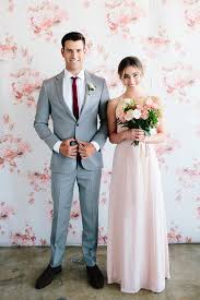 Well you're in luck, because here they come. Floral Wedding Party Style The Black Tux Groomsmen 100 Layer Cake