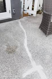 It's has been a month in a high traffic area and i love it so much i may not cover it up! How To Paint Stripes Like An Outdoor Rug On Patio Concrete Slab So Much Better With Age