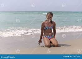 Teenage Girl Lying on the Sandy Beach on a Hot Summer Day Stock Photo -  Image of seashore, sandy: 160628148