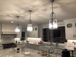 According to lightsonline.com you should space a pendant every 2 feet or so above a kitchen island and pick the right size of pendant to suit your island length. How To Light A Kitchen Island 5 Great Tips Lighting Tutor