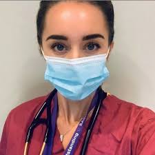 Peter Andre and doctor wife Emily beam behind their masks as she gets first  Covid jab