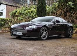 Image result for Onyx Black 2012 Aston Martin