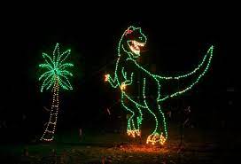 A Tyrannosaurus Rex Is On Display In The Dinosaur Den At The Fantasy Of Lights Holiday Light Show At Vasona Lake C Holiday Lights Fantasy Of Lights County Park