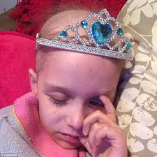 Girl left with single eyelash after chemo hair grows back