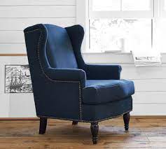 Though many may relax in a wingback armchair to watch football or read an exhilarating novel, the sitting room is not. Soma Delancey Wingback Upholstered Armchair Navy Pottery Barn Australia