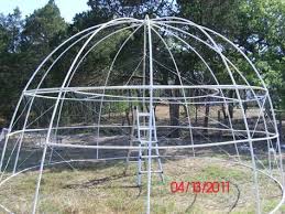 Pictures Of A Build It Yourself Pvc Dome Greenhouse Pool Cover Dome Greenhouse Backyard Greenhouse Greenhouse