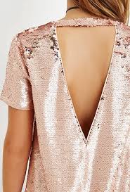 It is a strapless gold sequin skater dress. Rose Gold Sequins Rose Gold Fashion Gold Sequin Dress Fashion