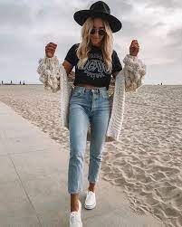 Light Jeans White Sneakers Black Hat Tan Cardigan Band Tee Graphic Tee Black Hat Outfit Outfits With Hats Casual Fall Outfits