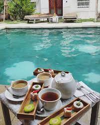 Enjoy The Afternoon Tea While Lounging At The Pool Care To Join Us Image By Jennyan1117