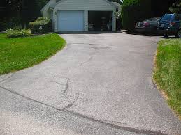 My best friend and i did the job ourselves. Asphalt Driveway