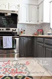 A Gray And White Kitchen Cabinets Upper Swiss Coffee And Lower Ocean Storm Both Valspa White Kitchen Makeover Gray And White Kitchen Kitchen Makeover