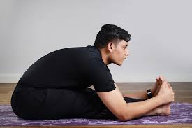 Paschimottanasana or seated Forward Bend Pose | Tapas Yoga Center | Dubai