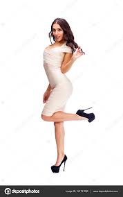 Young arabic woman in beige sexy dress Stock Photo by ©arkusha 141731292