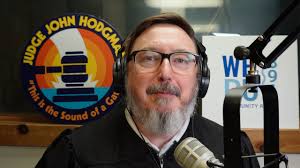 Is CASINO ROYALE starring Daniel Craig a remake of CASINO ROYALE from the  60s? Phaea says yes. Her husband, Justin, says no! Who's right? Who's  wrong?