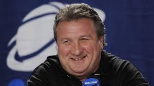 Da'Sean Butler and his coach Bob Huggins share an intimate moment