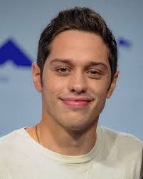 His body has several tattoos and that includes the badge number of his later father 8418 which is there on the arm. Pete Davidson Early Life And Life Achievements In His Comedy Career