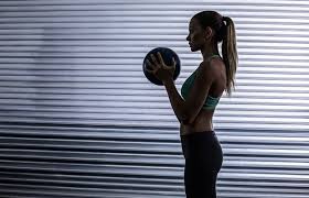 A medicine ball is a great workout tool. 5 Standing Ab Exercises For People Who Hate Crunches