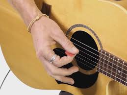 It was to be held with your thumb and index finger. How To Hold A Guitar Pick Properly Jamorama
